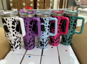 16 pics 40 oz. cow print tumbler