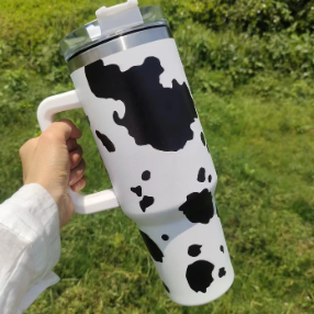 16 pics 40 oz. cow print tumbler